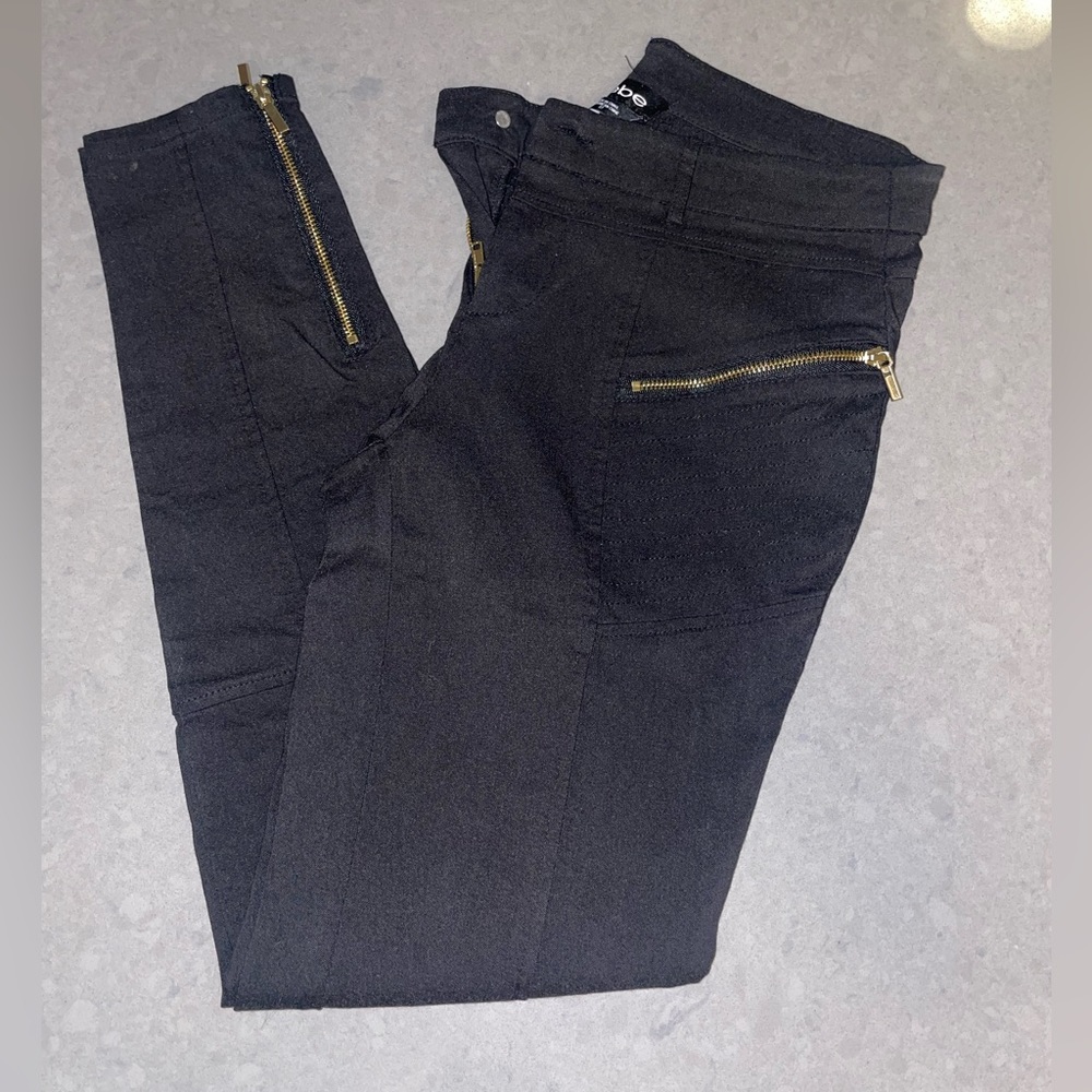 Bebe black skinny dress pants with gold zippers size 27